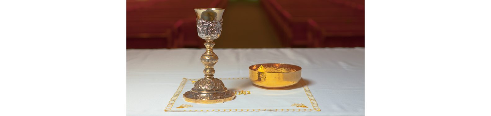 Chalice and Ciborium bowl on Altar