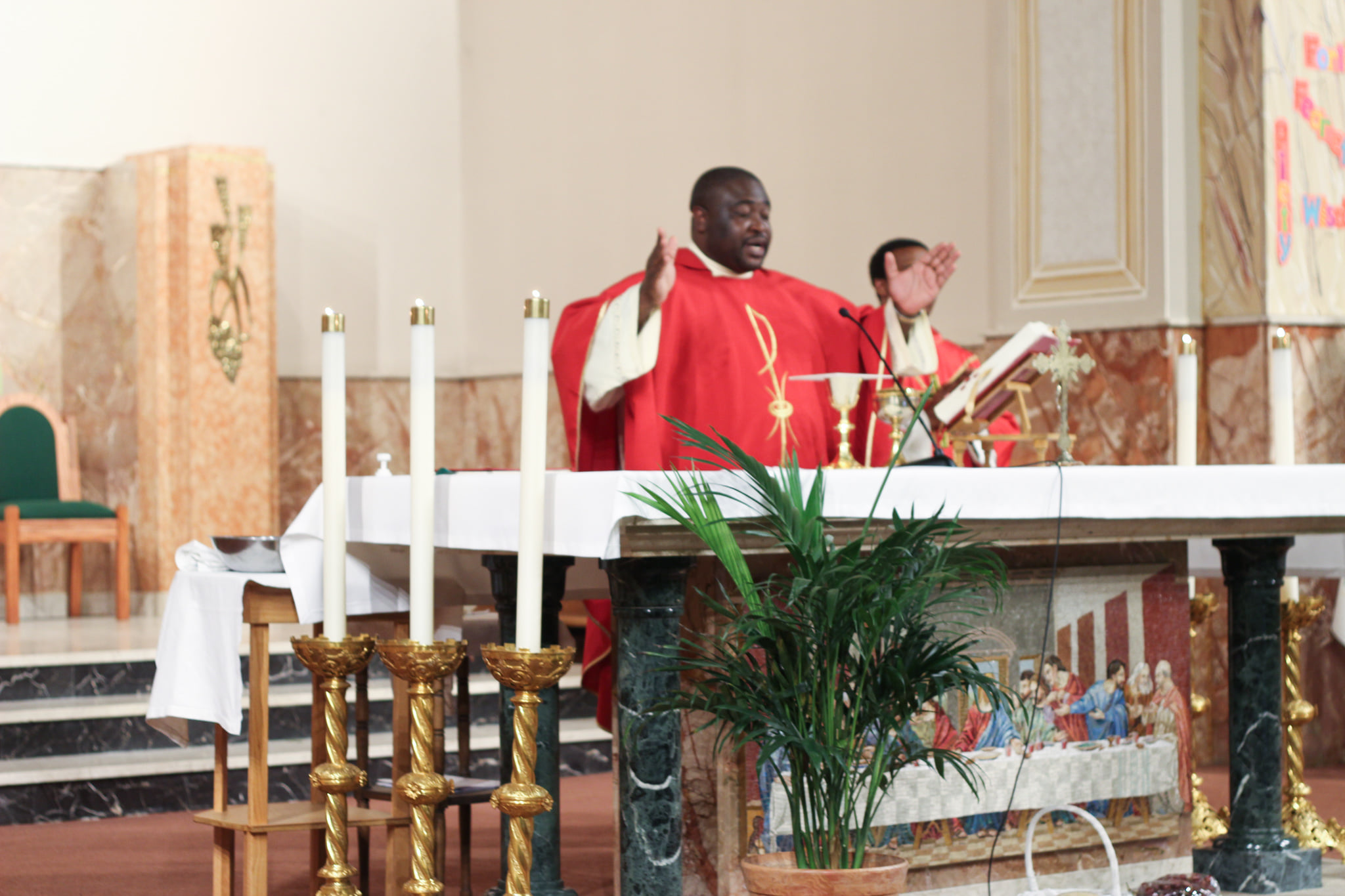 fr. simon celebrating mass