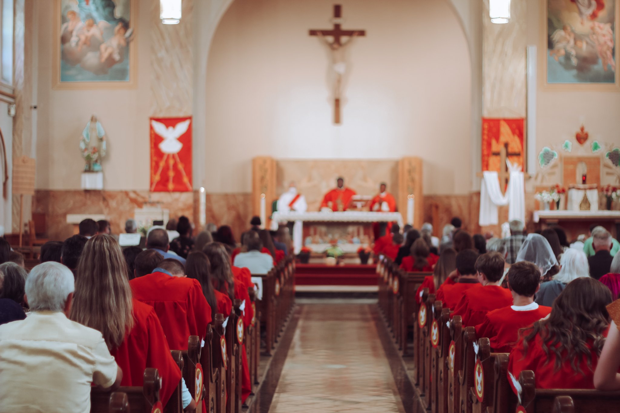 confirmation mass 2022- taken from back while all are kneeling